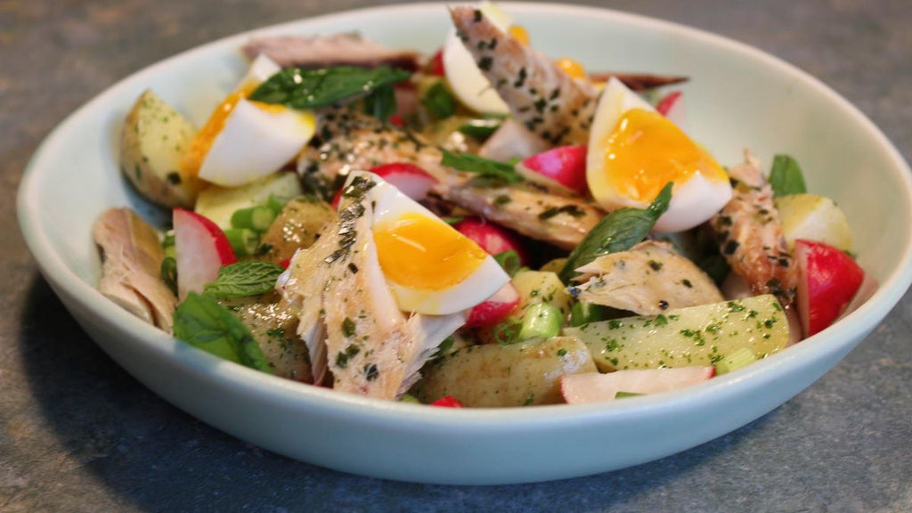 Smoked mackerel and potato salad, with a fudgy egg and radishes